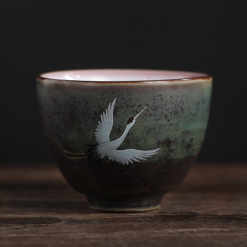 Tasse à thé en céramique avec grue de bon augure et Buddha Stones