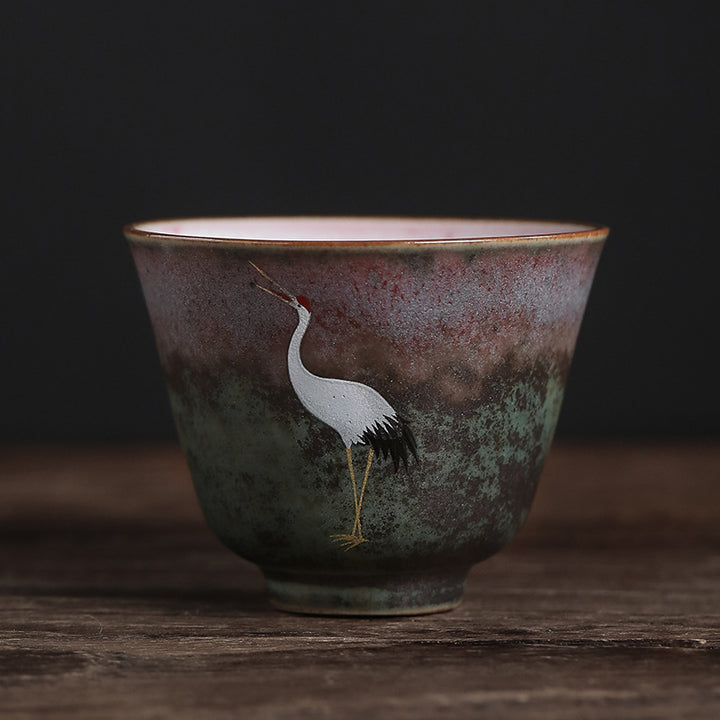 Tasse à thé en céramique avec grue de bon augure et Buddha Stones