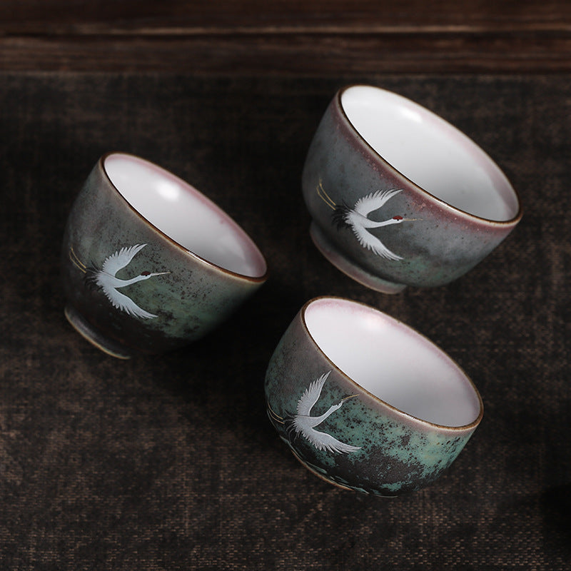 Tasse à thé en céramique avec grue de bon augure et Buddha Stones
