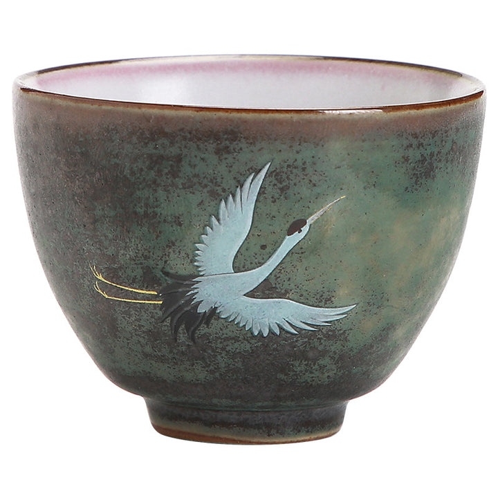 Tasse à thé en céramique avec grue de bon augure et Buddha Stones