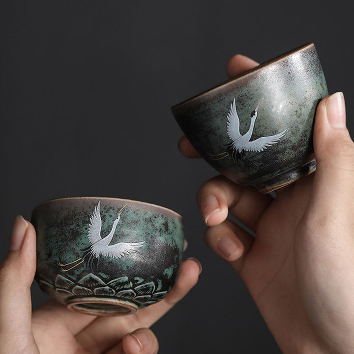 Tasse à thé en céramique avec grue de bon augure et Buddha Stones