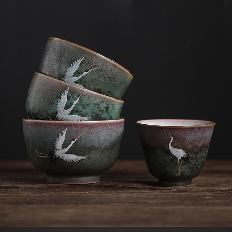 Tasse à thé en céramique avec grue de bon augure et Buddha Stones