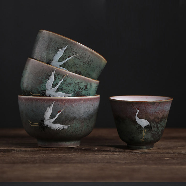 Tasse à thé en céramique avec grue de bon augure et Buddha Stones