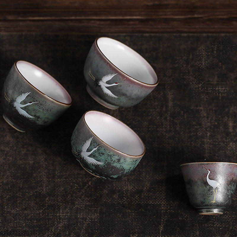 Tasse à thé en céramique avec grue de bon augure et Buddha Stones
