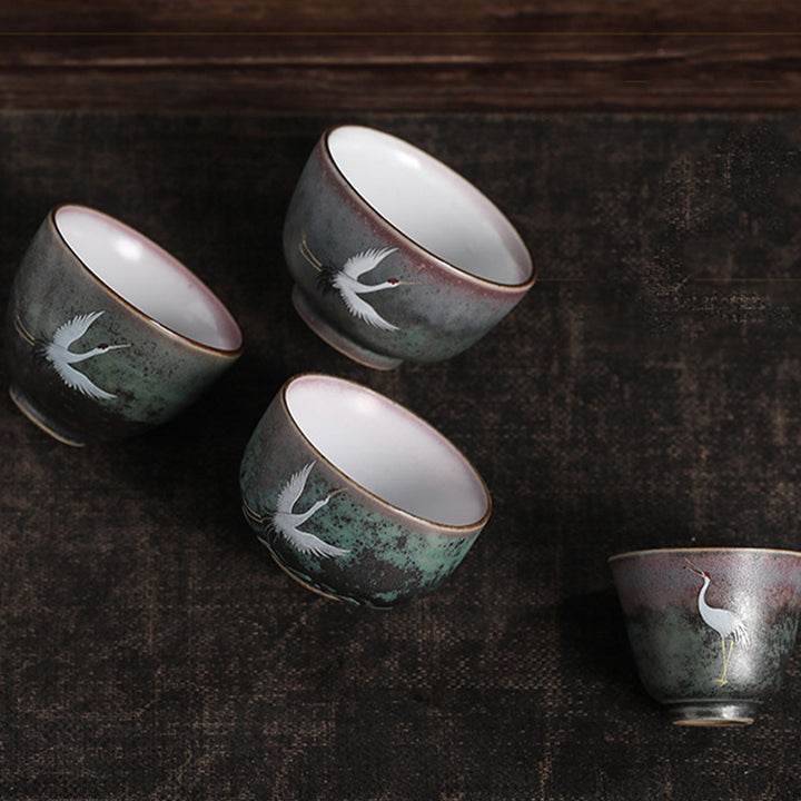 Tasse à thé en céramique avec grue de bon augure et Buddha Stones