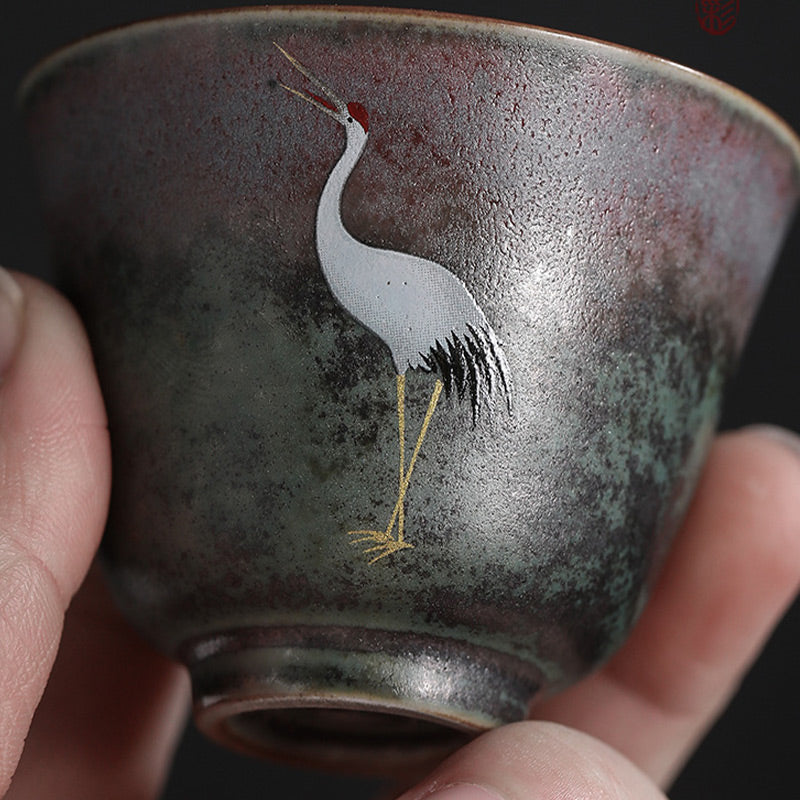 Tasse à thé en céramique avec grue de bon augure et Buddha Stones