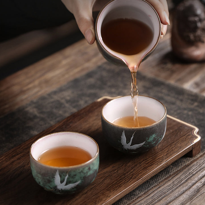 Tasse à thé en céramique avec grue de bon augure et Buddha Stones