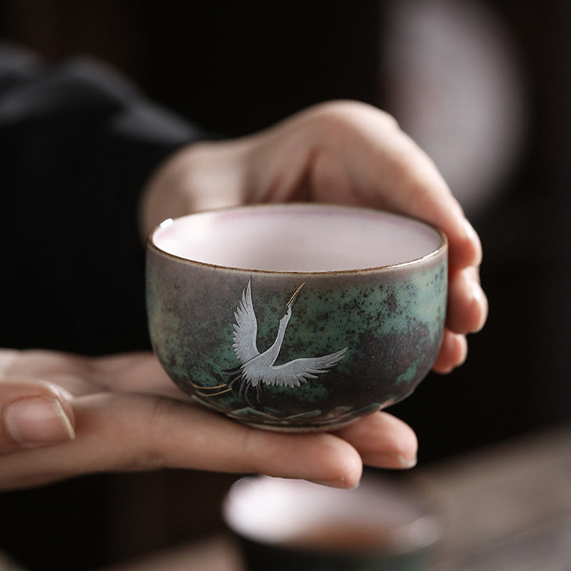 Tasse à thé en céramique avec grue de bon augure et Buddha Stones