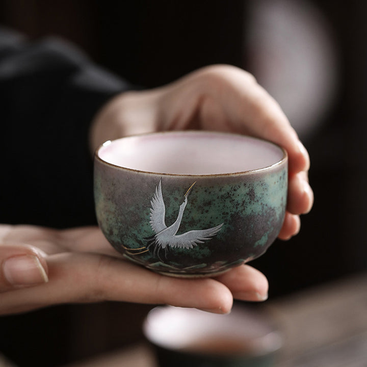 Tasse à thé en céramique avec grue de bon augure et Buddha Stones