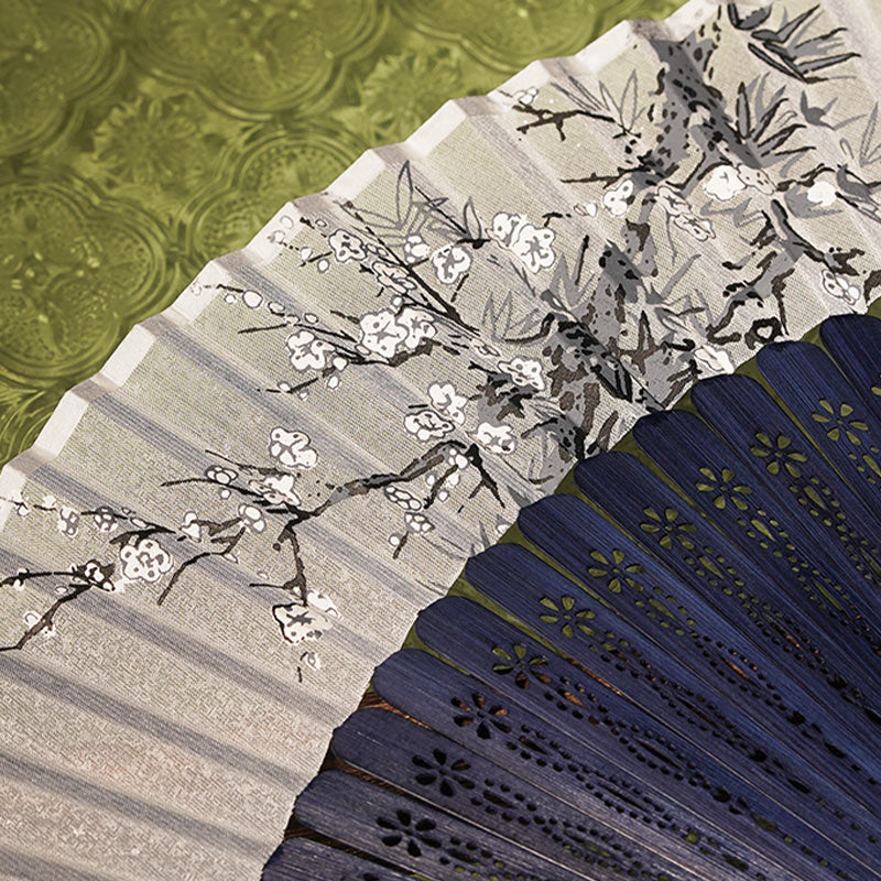 Éventail pliable en bambou avec Buddha Stones et branches de fleurs anciennes 21 cm