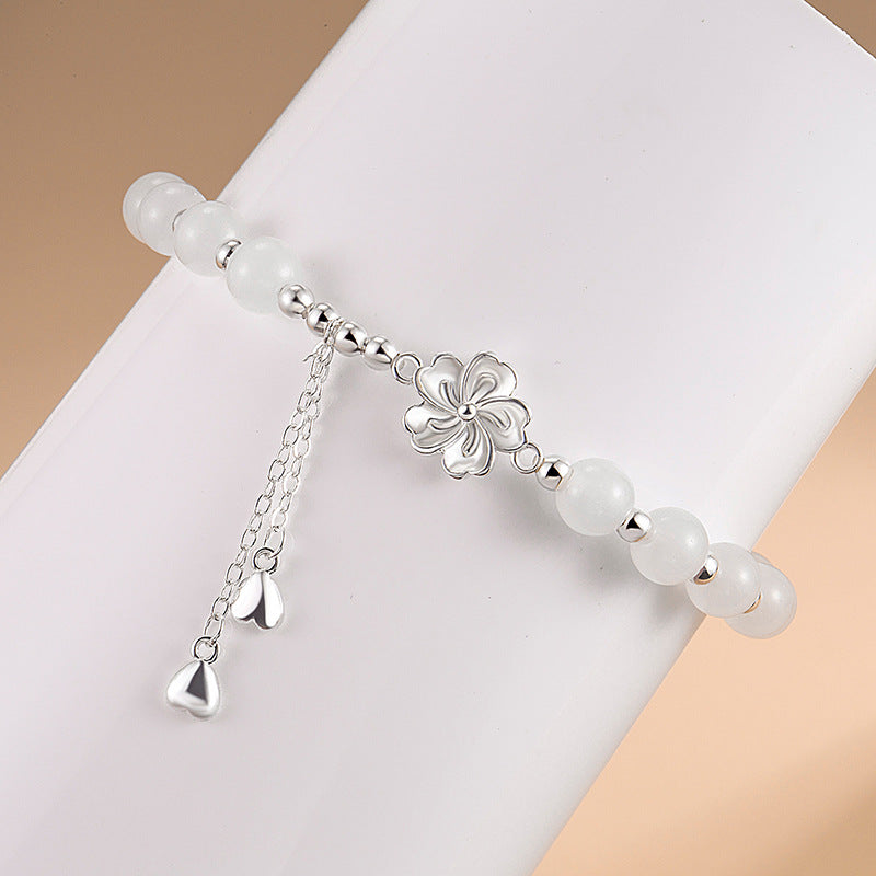 Bracelet porte-bonheur en jade blanc et pétales de fleur de pêcher Buddha Stones