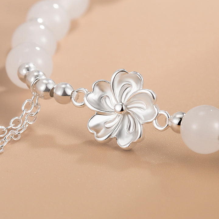 Bracelet porte-bonheur en jade blanc et pétales de fleur de pêcher Buddha Stones