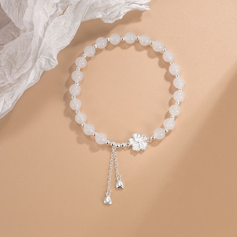Bracelet porte-bonheur en jade blanc et pétales de fleur de pêcher Buddha Stones