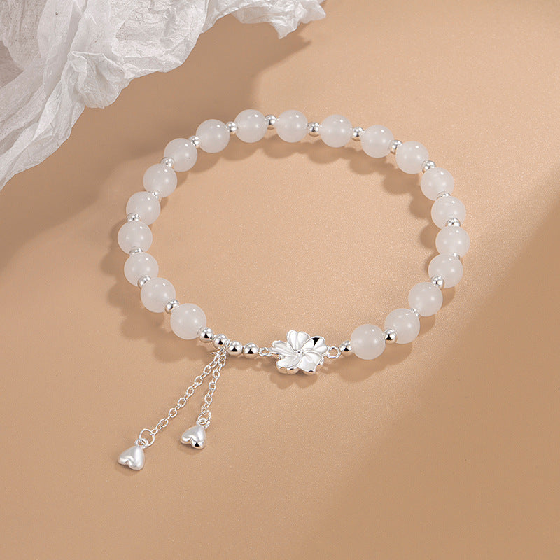 Bracelet porte-bonheur en jade blanc et pétales de fleur de pêcher Buddha Stones