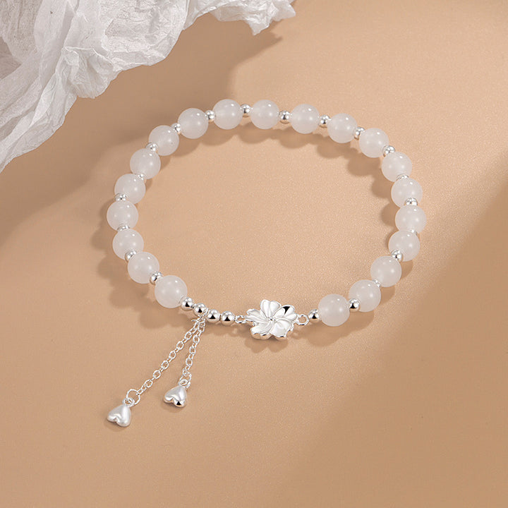 Bracelet porte-bonheur en jade blanc et pétales de fleur de pêcher Buddha Stones
