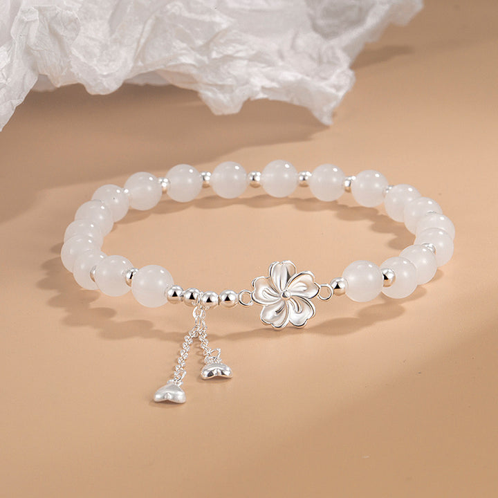 Bracelet porte-bonheur en jade blanc et pétales de fleur de pêcher Buddha Stones