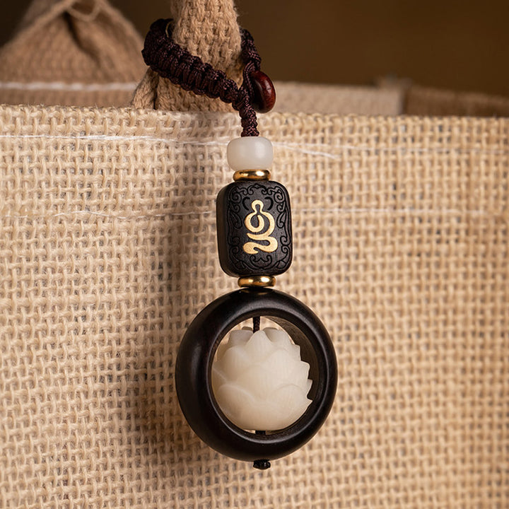 Porte-clés décoratif en Buddha Stones en bois d'ébène, graines de Bodhi, lotus, illumination