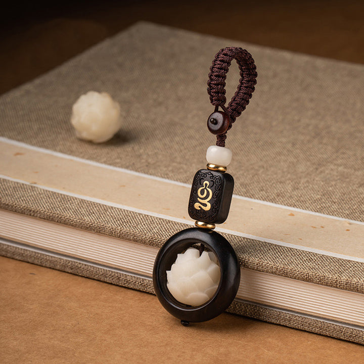 Porte-clés décoratif en Buddha Stones en bois d'ébène, graines de Bodhi, lotus, illumination