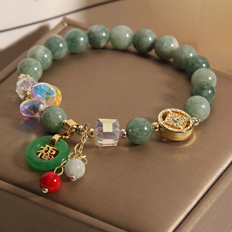 Bracelet de guérison à breloques en jade et quartz fraise Buddha Stones