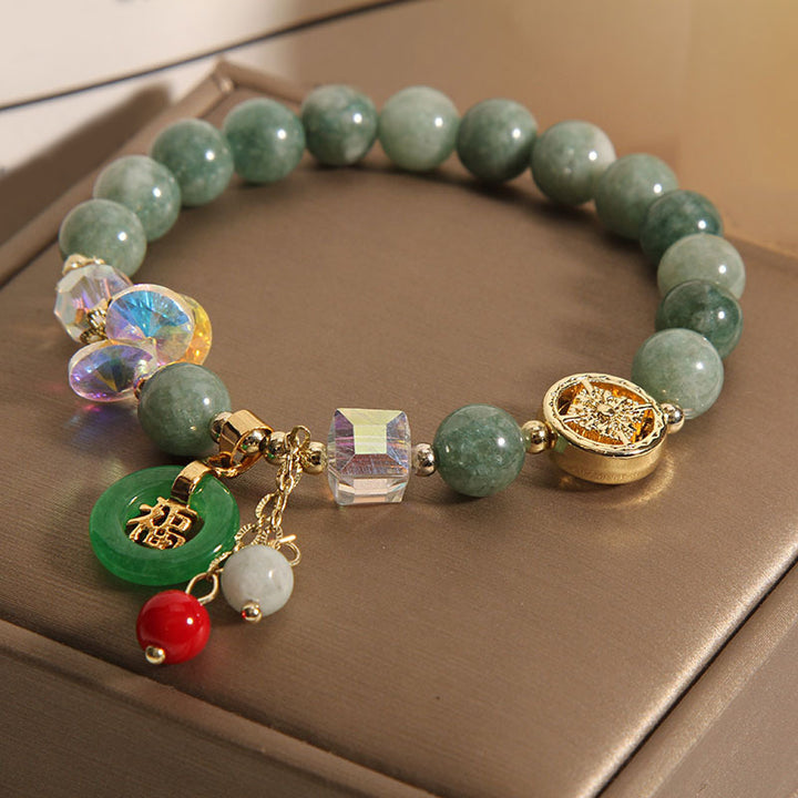 Bracelet de guérison à breloques en jade et quartz fraise Buddha Stones