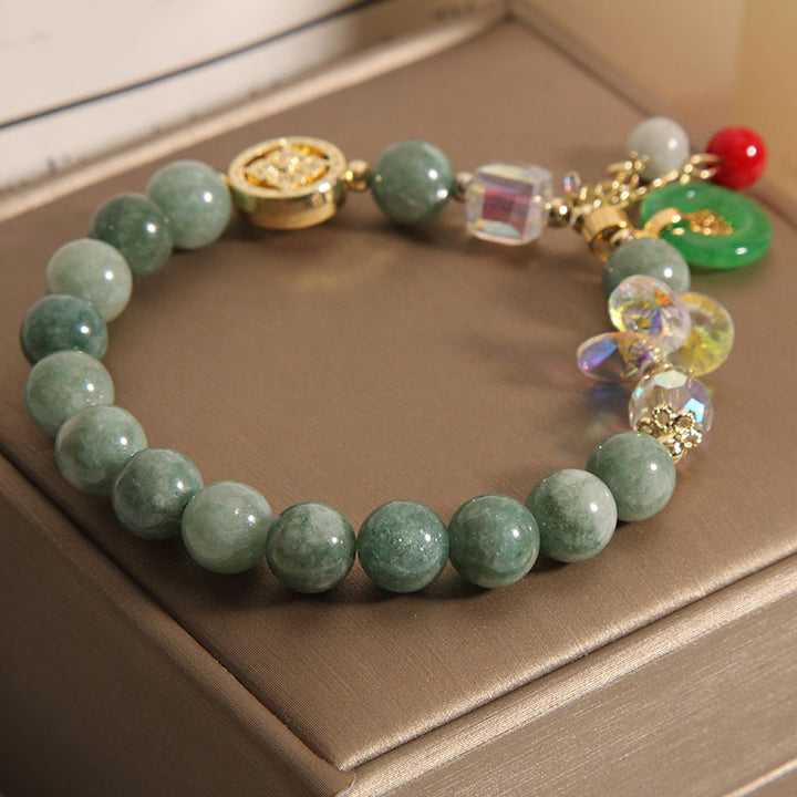 Bracelet de guérison à breloques en jade et quartz fraise Buddha Stones