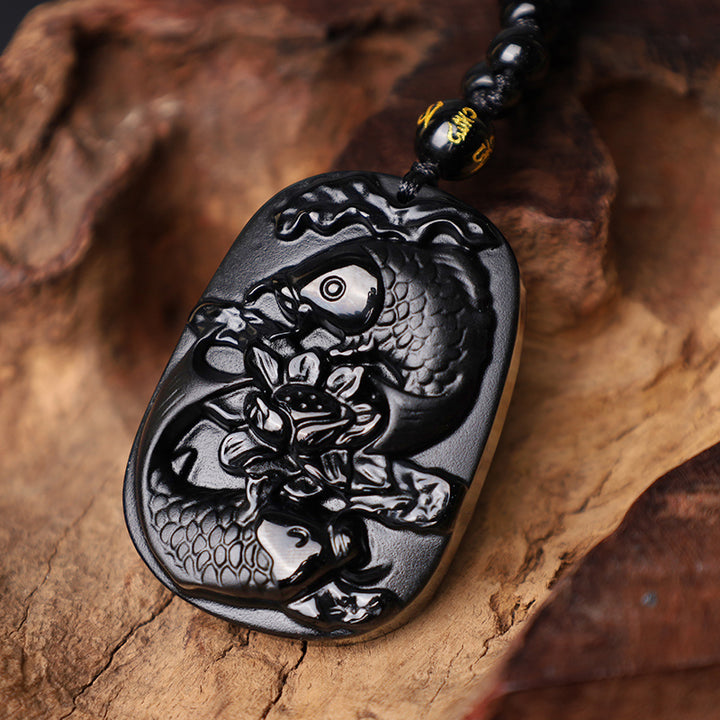 Collier avec pendentif en perles de force de lotus en obsidienne noire naturelle de Buddha Stones
