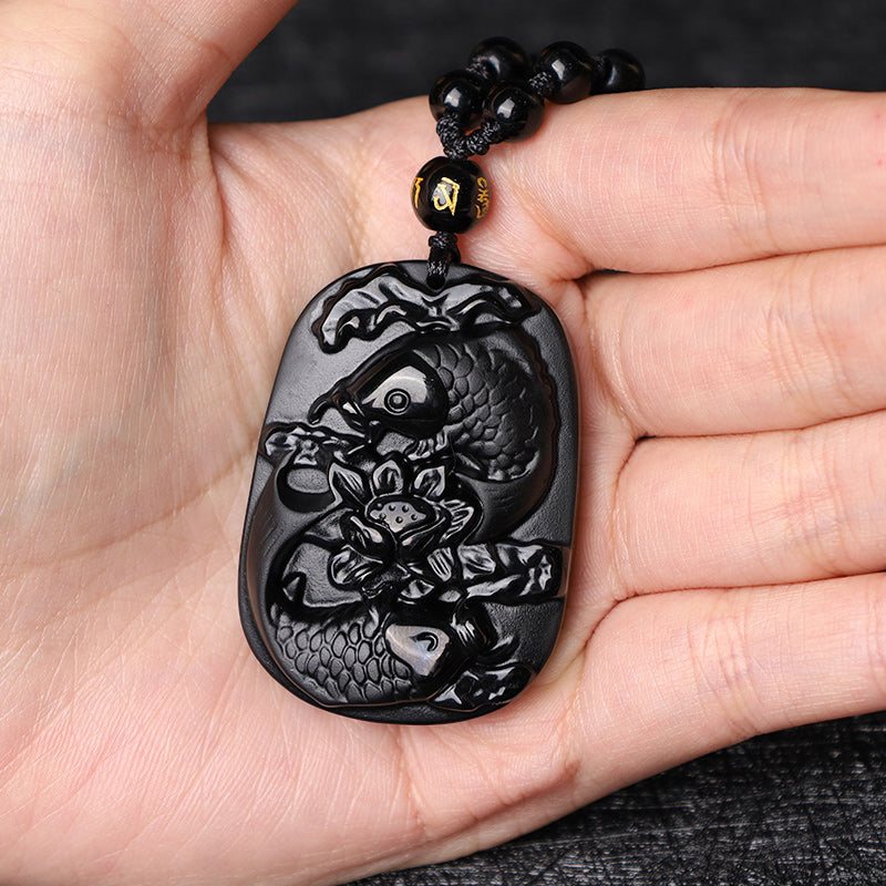 Collier avec pendentif en perles de force de lotus en obsidienne noire naturelle de Buddha Stones