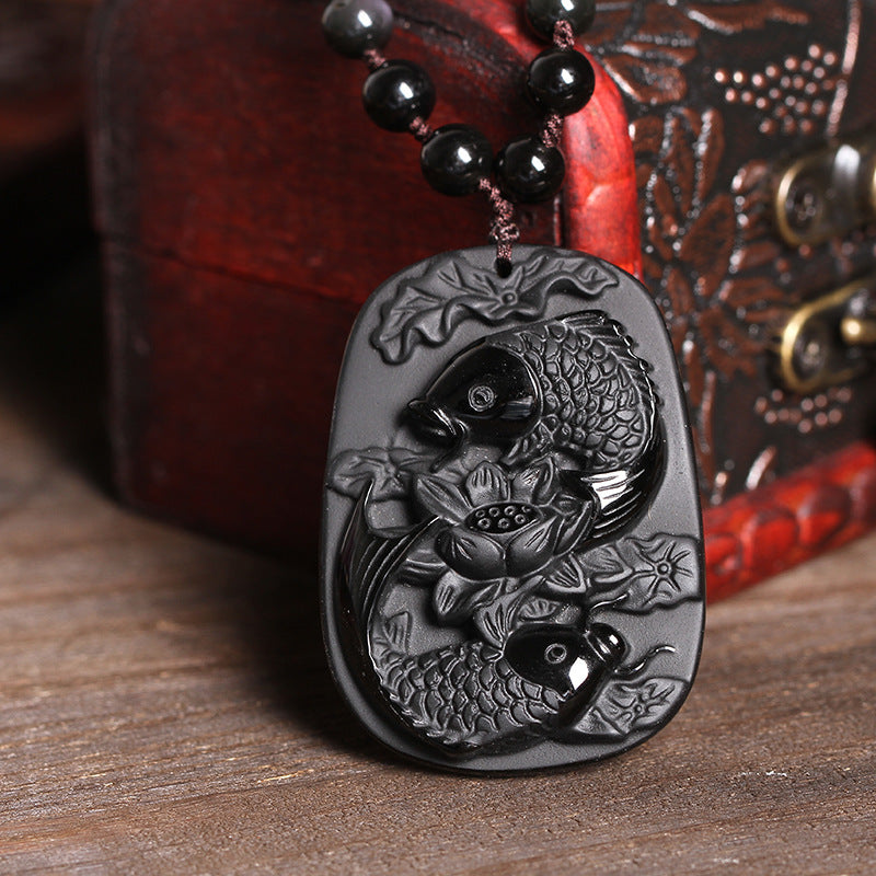 Collier avec pendentif en perles de force de lotus en obsidienne noire naturelle de Buddha Stones