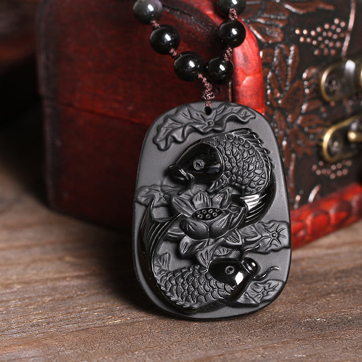 Collier avec pendentif en perles de force de lotus en obsidienne noire naturelle de Buddha Stones