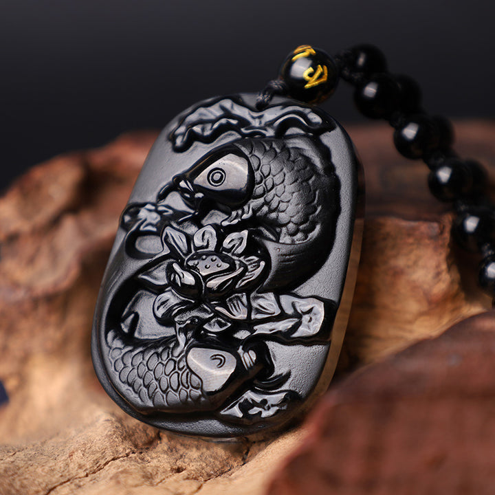 Collier avec pendentif en perles de force de lotus en obsidienne noire naturelle de Buddha Stones