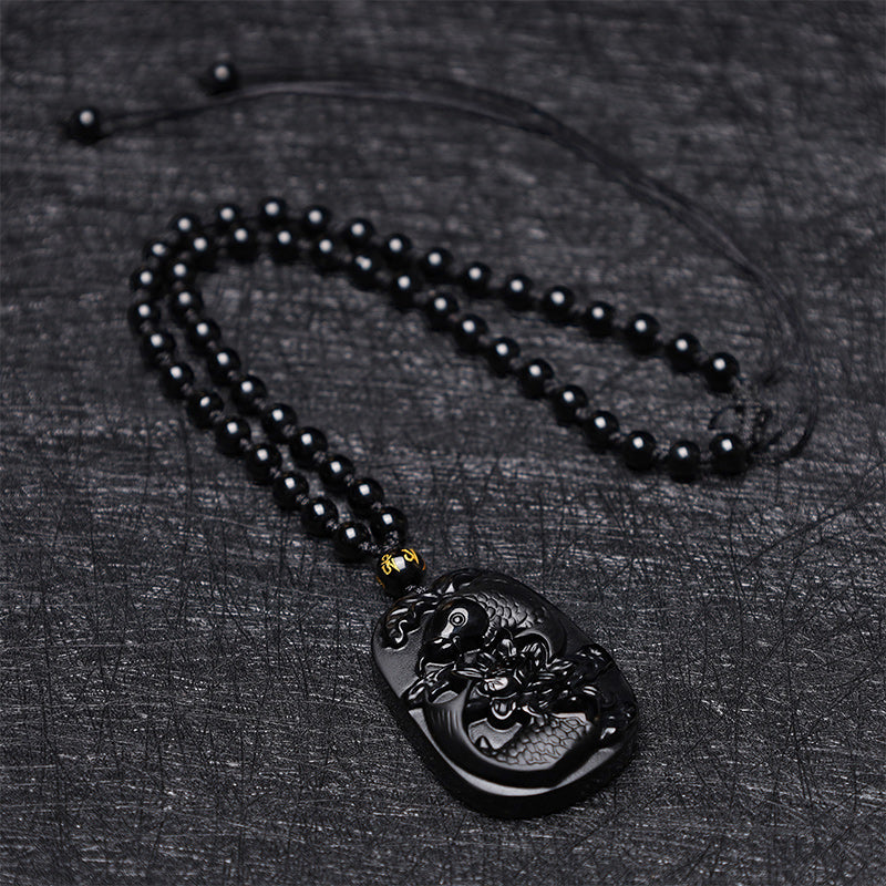 Collier avec pendentif en perles de force de lotus en obsidienne noire naturelle de Buddha Stones