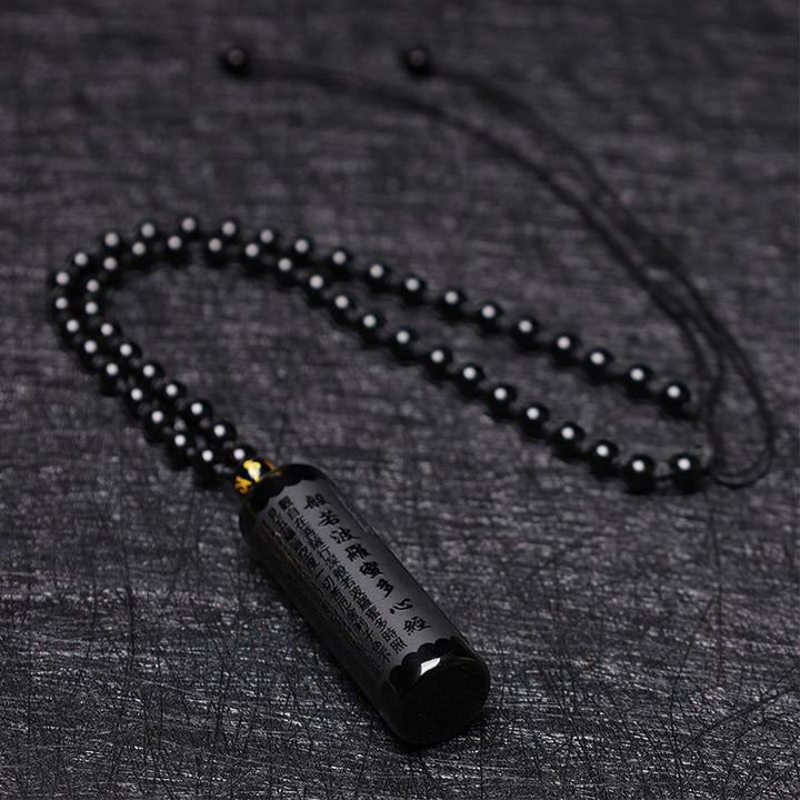 Collier pendentif de purification du Sutra du cœur en obsidienne noire naturelle de Buddha Stones