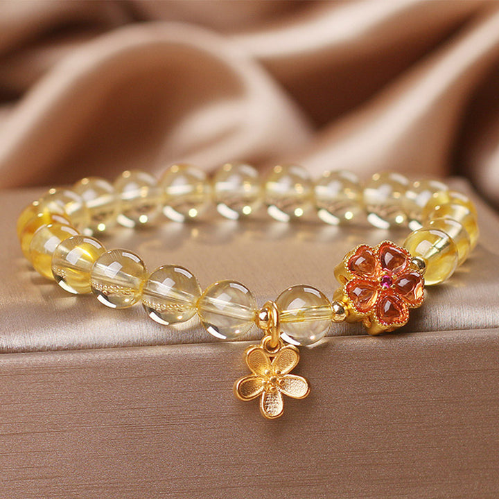 Bracelet de protection et de prospérité avec breloque en forme de fleur de citrine naturelle et Buddha Stones