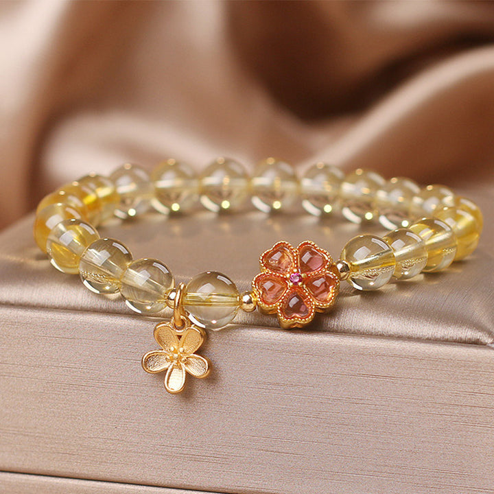 Bracelet de protection et de prospérité avec breloque en forme de fleur de citrine naturelle et Buddha Stones