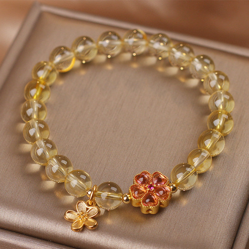 Bracelet de protection et de prospérité avec breloque en forme de fleur de citrine naturelle et Buddha Stones