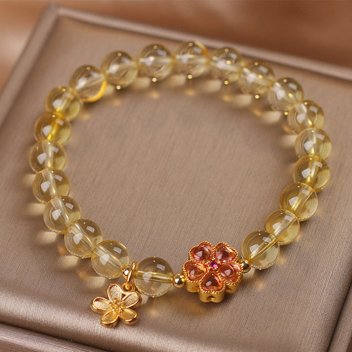 Bracelet de protection et de prospérité avec breloque en forme de fleur de citrine naturelle et Buddha Stones