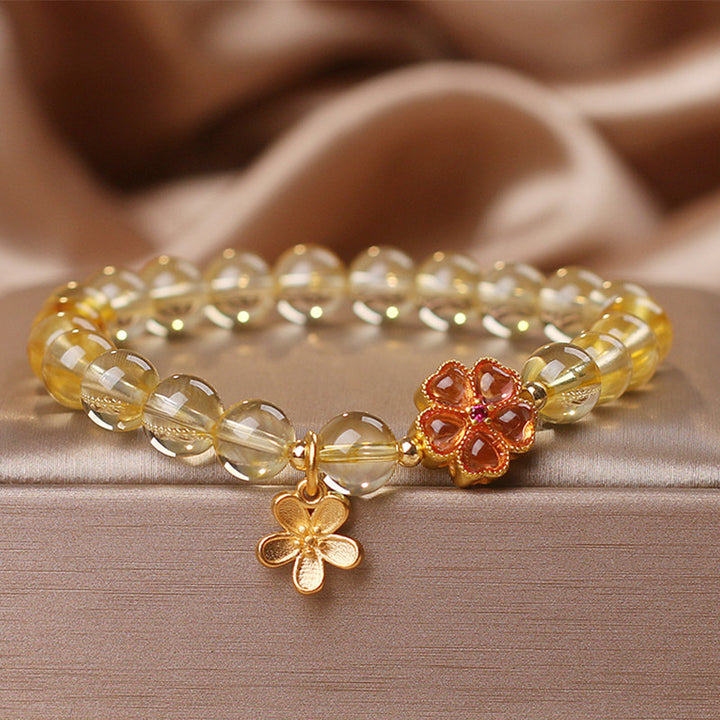 Bracelet de protection et de prospérité avec breloque en forme de fleur de citrine naturelle et Buddha Stones
