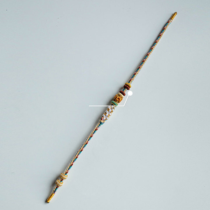 Bracelet tressé fait main en Buddha Stones avec motif de fleur de pêcher de couleur Dunhuang