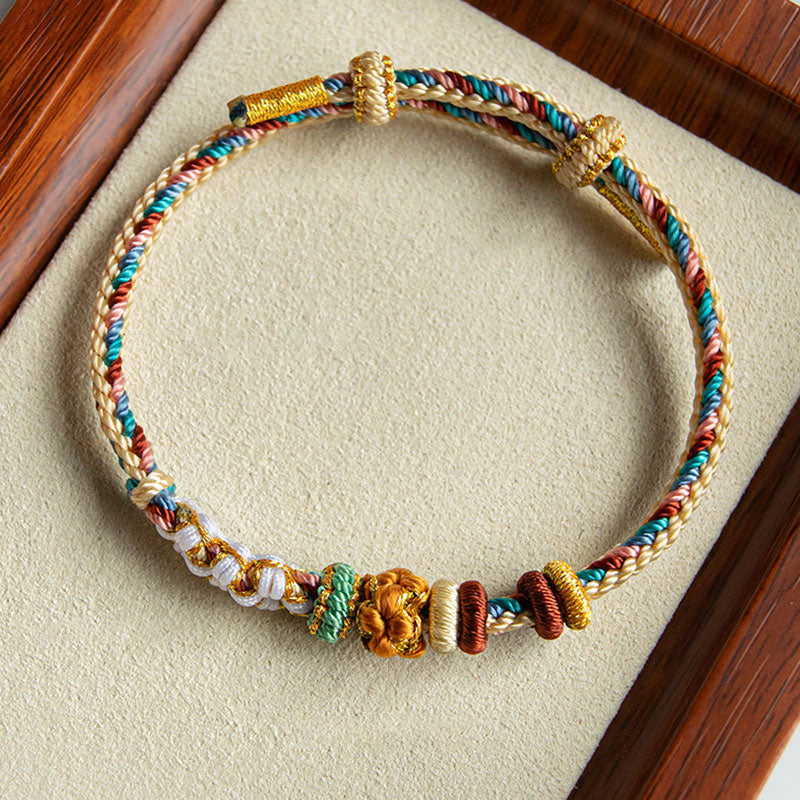 Bracelet tressé fait main en Buddha Stones avec motif de fleur de pêcher de couleur Dunhuang