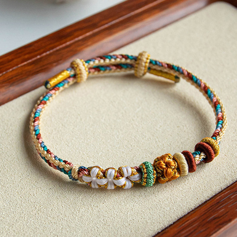 Bracelet tressé fait main en Buddha Stones avec motif de fleur de pêcher de couleur Dunhuang