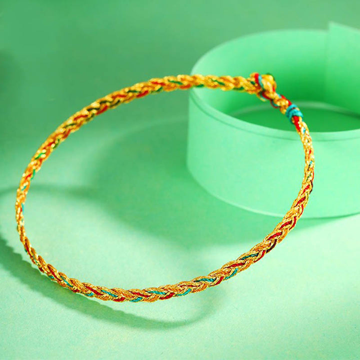Bracelet tressé en écailles de dragon multicolores fait main par Buddha Stones