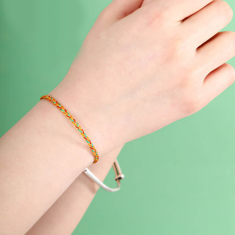 Bracelet tressé en écailles de dragon multicolores fait main par Buddha Stones