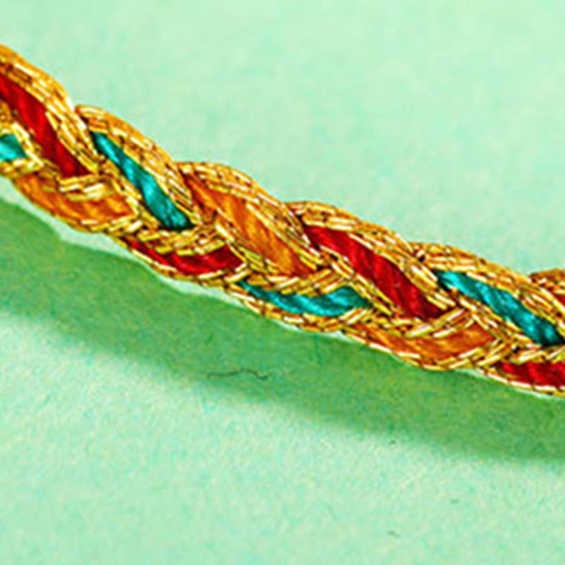 Bracelet tressé en écailles de dragon multicolores fait main par Buddha Stones