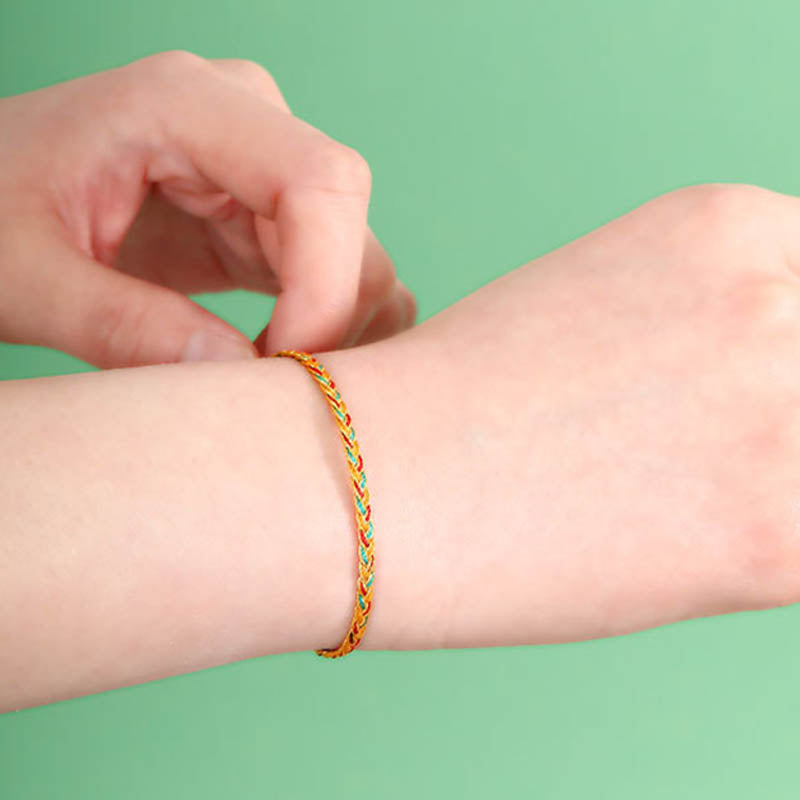 Bracelet tressé en écailles de dragon multicolores fait main par Buddha Stones