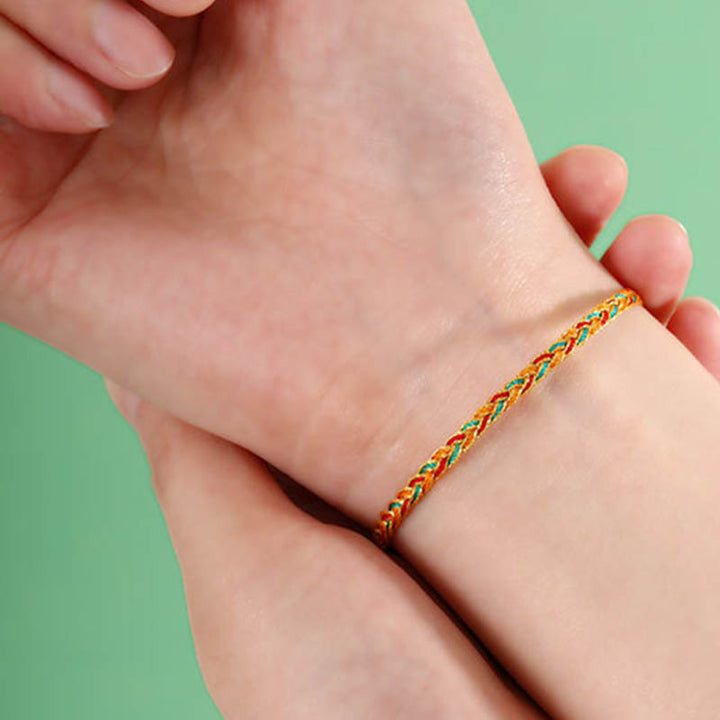 Bracelet tressé en écailles de dragon multicolores fait main par Buddha Stones