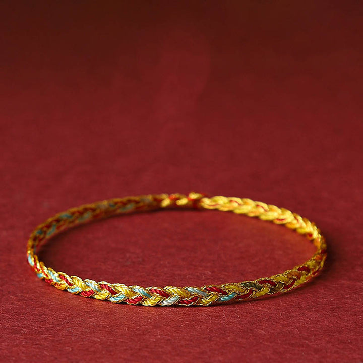 Bracelet tressé en écailles de dragon multicolores fait main par Buddha Stones
