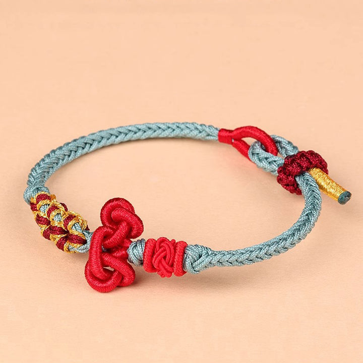 Bracelet en corde tressée fait main avec nœud Wenchang et Buddha Stones