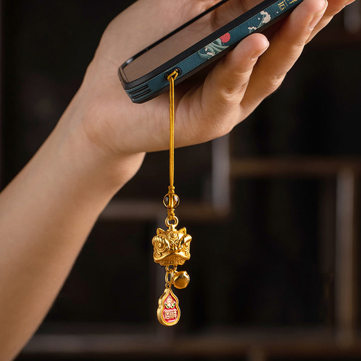 Buddha Stones Lion dansant Auspicieux Ruyi Paix Sûre Riche Cuivre Richesse Téléphone Décoration Suspendue