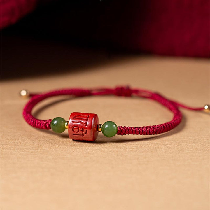 Bracelet en corde tressée avec bénédiction gravée Om Mani Padme Hum et Buddha Stones Tibetam Cinnabar