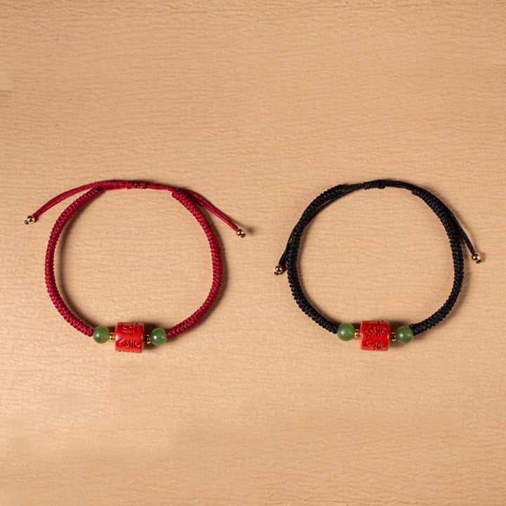 Bracelet en corde tressée avec bénédiction gravée Om Mani Padme Hum et Buddha Stones Tibetam Cinnabar